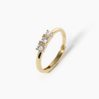 Anello trilogy in argento placcato oro con zirconi