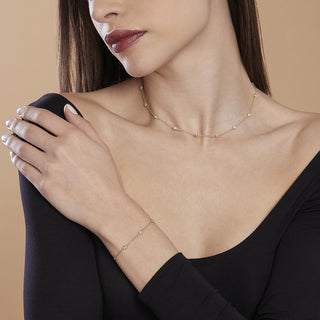 Bracciale in argento placcato oro con zirconi punto luce