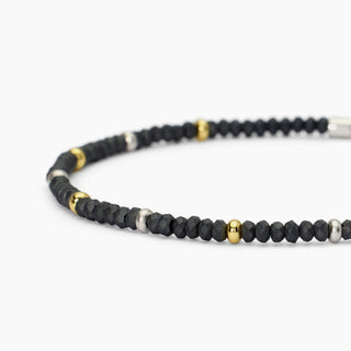 Bracciale in argento con ematite e inserti dorati