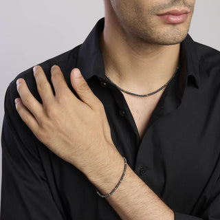 Bracciale in argento con ematite e inserti dorati
