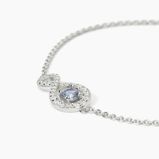 Bracciale in argento con infinito e acquamarina sintetica