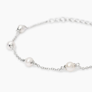 Bracciale in argento con perle coltivate e catena rolò
