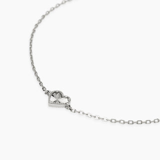 Bracciale in argento con catena forzatina e cuore