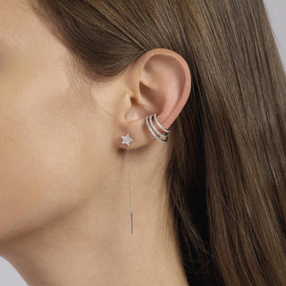 Orecchini pendenti in argento con stelle pavé